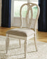 Realyn Dining Table and 4 Chairs