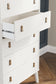 Aprilyn Queen Panel Headboard with Dresser, Chest and Nightstand